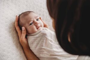 Detail view of newborn features captured by an Ingleburn newborn photographer in natural light